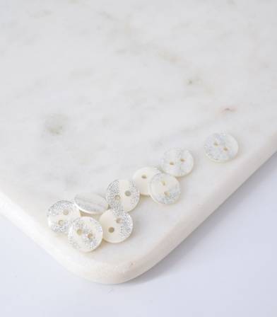 Boutons blancs paillettes argents - 10mm