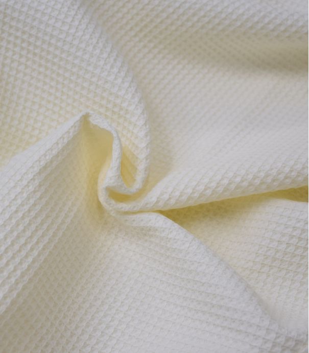 Tissu Nid d'abeille coton bio - Ivoire Tissu Nid d'abeille coton bio - Ivoire