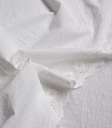 Tissu voile de coton plumetis festonné - Alma Tissu voile de coton plumetis festonné - Alma