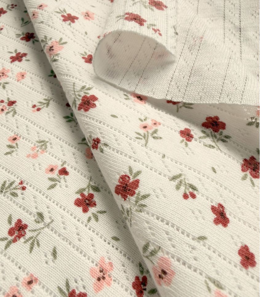 Tissu jersey pointelle - Fleurettes Tissu jersey pointelle - Fleurettes