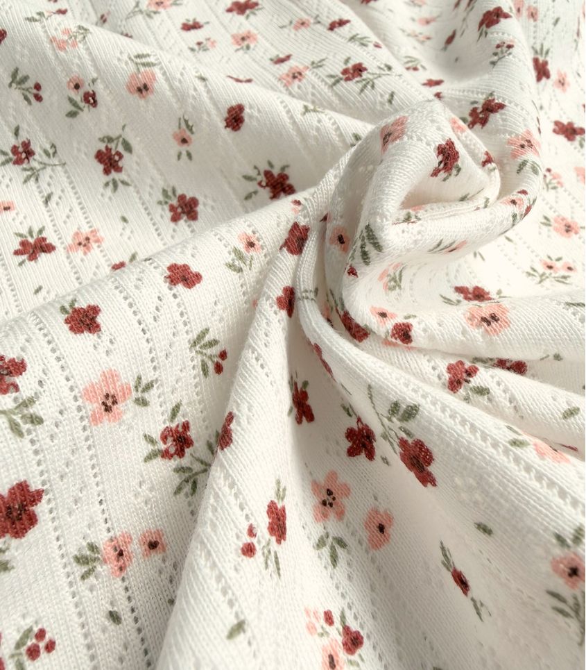 Tissu jersey pointelle - Fleurettes Tissu jersey pointelle - Fleurettes