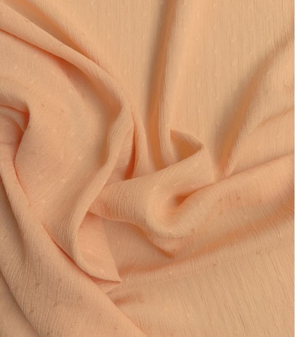 Tissu viscose plumetis crinkle - Pêche