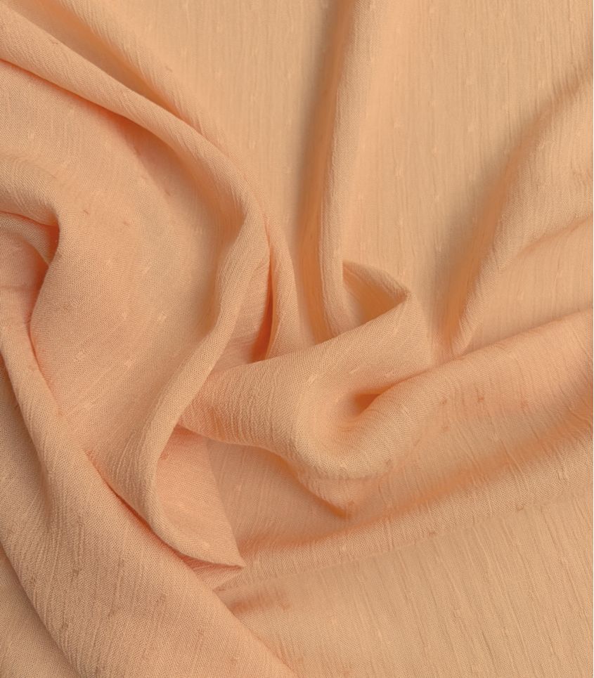 Tissu viscose plumetis crinkle - Pêche