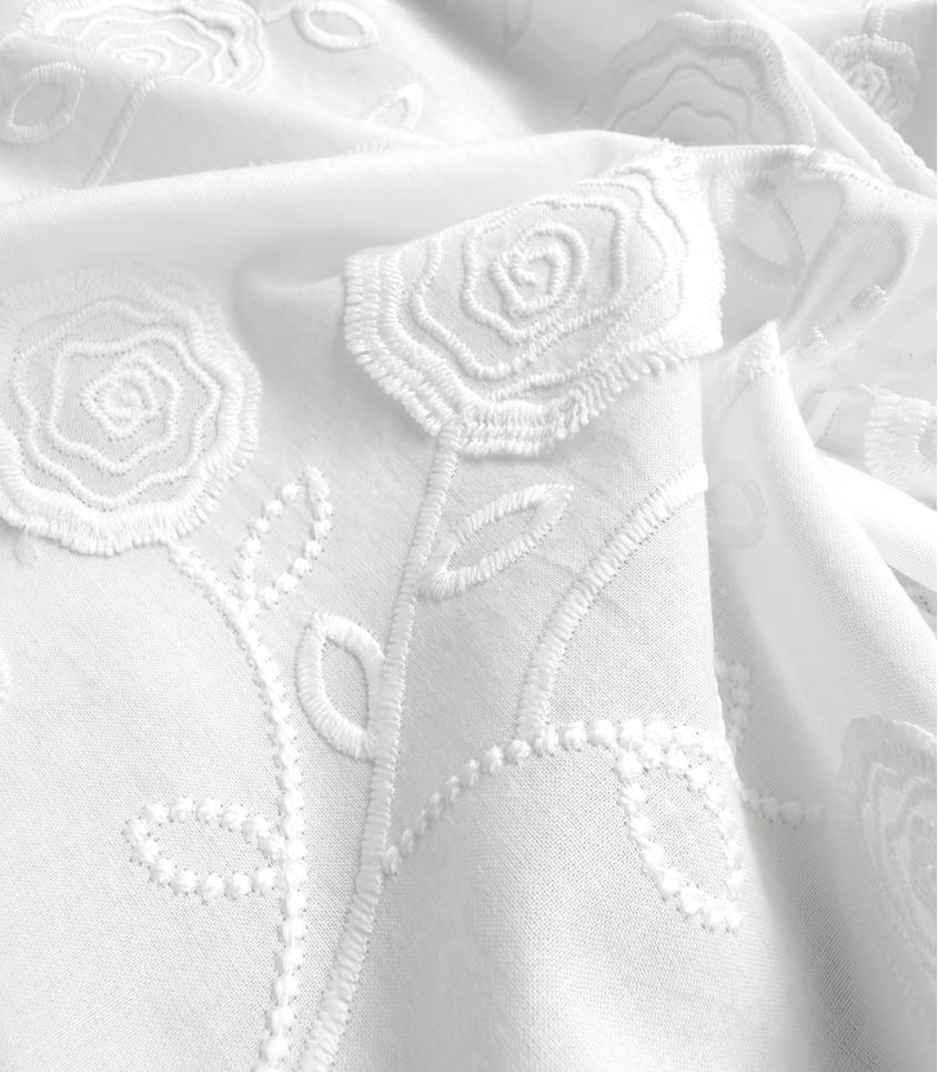Tissu coton brodé - Capucine Tissu coton brodé - Capucine