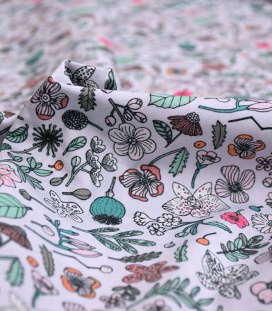 Popeline fleurs sur lilas 