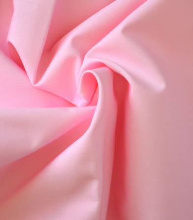 Tissu popeline de coton rose dragée