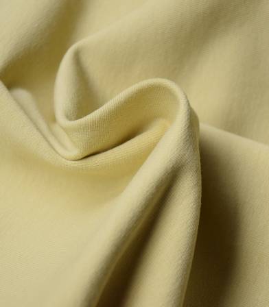 Tissu bio Jersey - Dusty Yellow Tissu bio Jersey - Dusty Yellow