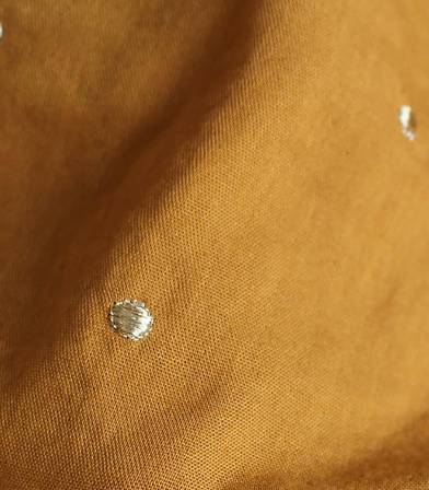 Tissu Stardust ochre Tissu Stardust ochre